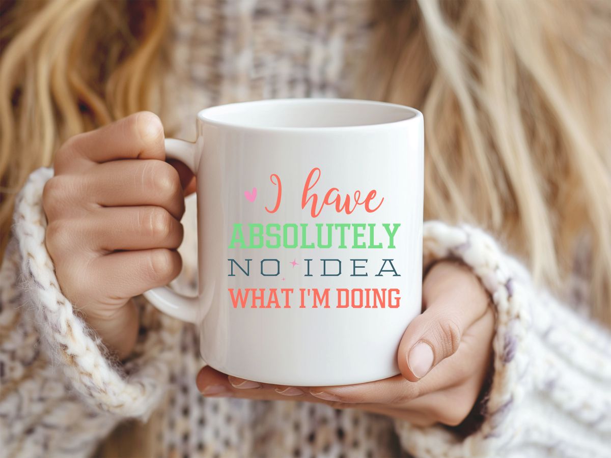 Person holding a white mug with humorous text