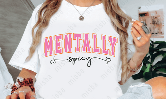 Person wearing a white t-shirt with 'MENTALLY spicy' text in pink and black.